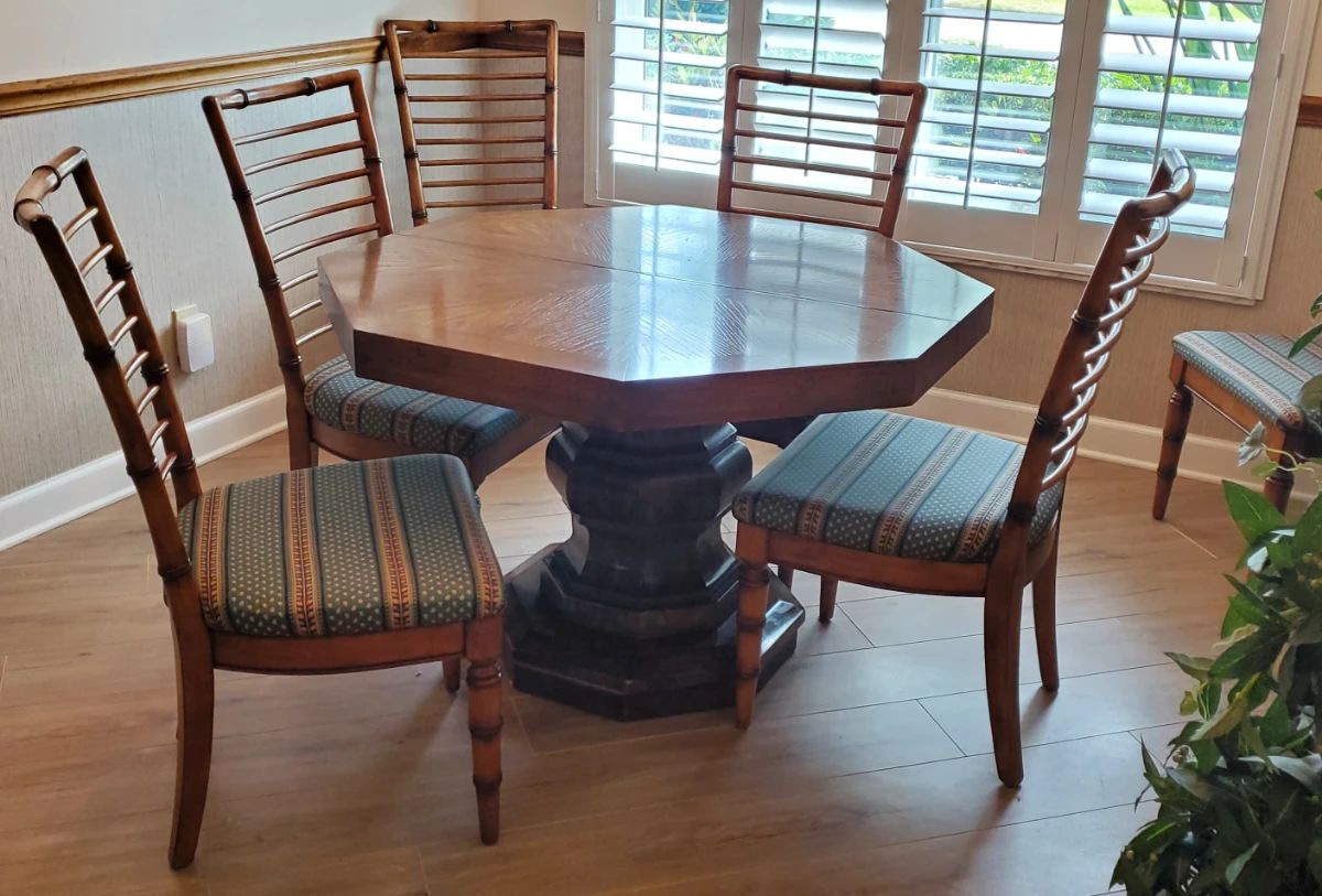 Mid Century dinette with 2 leaves and table covers. Matching sideboard also available.