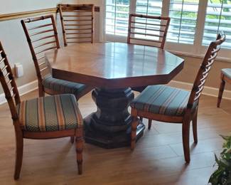 Mid Century dinette with 2 leaves and table covers. Matching sideboard also available.