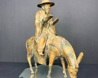 PM017 Metal Sculpture of a Man on a Mule