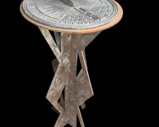 Handmade metal table.      Sundial