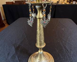 Brass Candlestick with Decorative Engravings and Dangling Ornaments