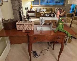 Singer sewing machine in table 