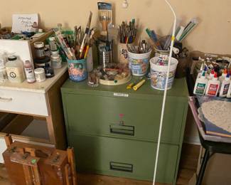 Art supplies, filing cabinets, easel