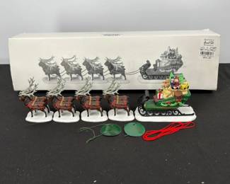Lot #135 - Department 56 Heritage Village Sleigh & Eight Tiny Reindeer Christmas Figurine Set