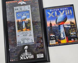 Lot #18 - Official NFL Super Bowl XLVIII Denver Broncos vs Seattle Seahawks Game Program with Framed Ticket Stub