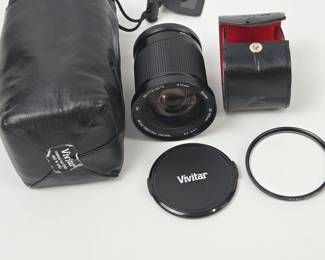 Lot #21 - Vivitar 28-105mm f/3.5-4.5 Macro Focusing Zoom Lens with Rilex LMC-Haze 72mm Filter & Leather Cases