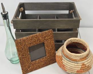 Lot #53 - Wood Bottle Crate, Glass Oil Dispenser Bottle, Southwestern Hand-Woven Coiled Basket Pot & Wooden Bead Photo Frame