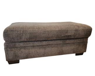Lot #38 - Large Gray Textured Fabric Storage Ottoman with Dark Wood Legs - Functional & Stylish Furniture