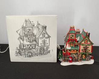Lot #133 - Department 56 North Pole Series "Glass Ornament Works" Lighted Building with Snow and Festive Detailing