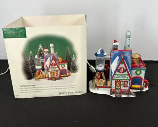 Lot #145 - Department 56 North Pole Series Real Plastic Snow Factory Lighted Christmas Village