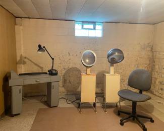 Taking appointments for manicures and/or hair styling.  This vintage beauty shop would look great in any salon!