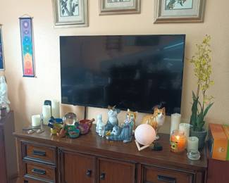 TV, buffet and small decor - cool crystal ball and tibetan singing bowls