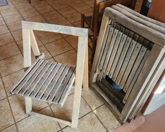 4 folding teak chairs. I have 4 of these and I love them. Really comfortable seats
