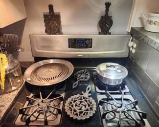 4 decorative Cast Iron Trivets