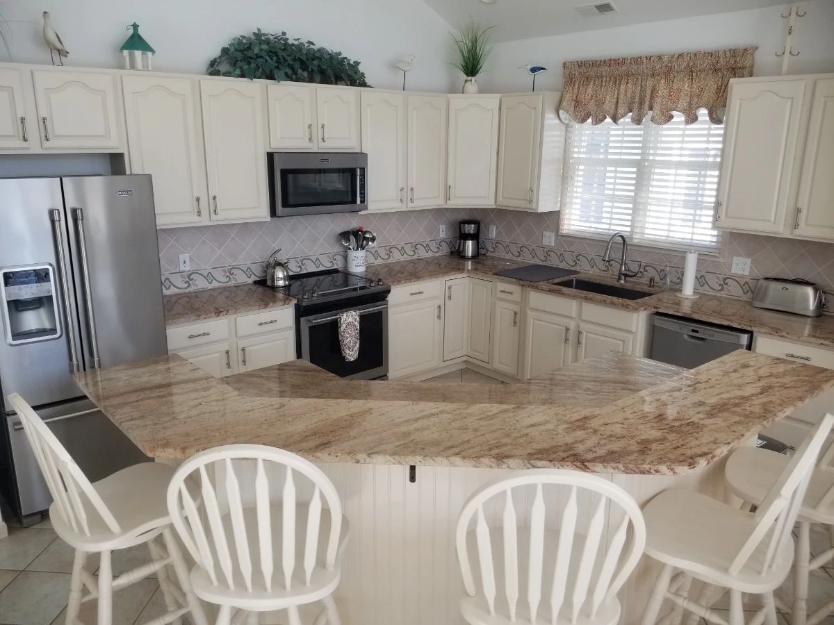 Pretty kitchen with plenty of cabinets