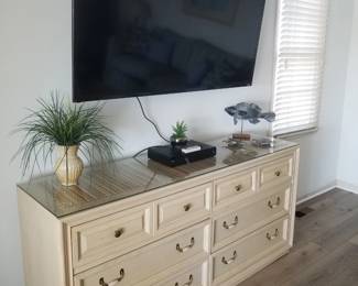 8-drawer dresser; flat screen TV with bracket