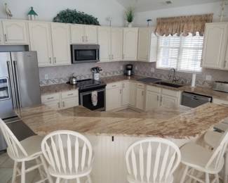 Pretty kitchen with plenty of cabinets