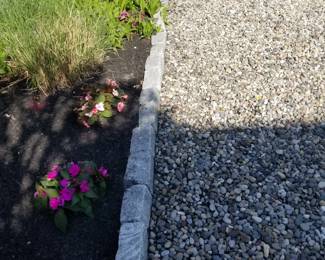 Belgian blocks; gravel; plants
