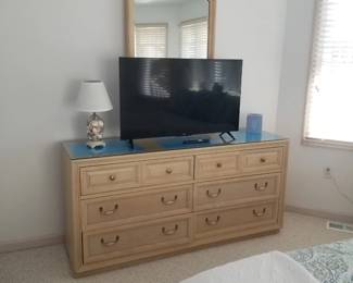 Queen bedrrom suite: dresser with mirror; flat screen TV