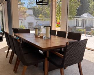 JANUS Et Cie Teak Dining Table With Power Coated Steel Base. Measures 88"L  x 44" W.  Photo. 1 of 5. 