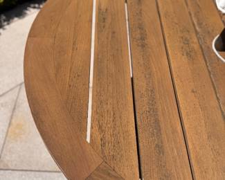 JANUS Et Cie 60" Round Teak Dining Table With Power Coated Steel Base - 2 Available. Measures 30" H. The Tables Are In Great Condition. Photo 4 of 4. 