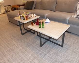 Pair of stone top metal base coffee tables