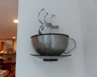 Chrome teacup wall hanging