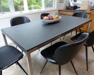 Dining table with slate top, chrome base/legs & 6 black chairs