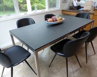 Dining table with slate top, chrome base/legs & 6 black chairs