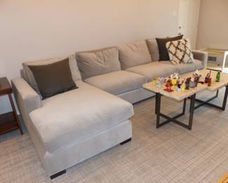 Mint gray sectional sofa, pair of stone top metal base coffee tables