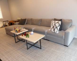 Mint gray sectional sofa, pair of stone top metal base coffee tables