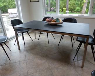 Dining table with slate top, chrome base/legs & 6 black chairs