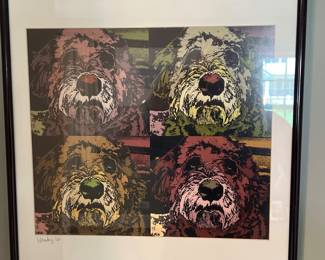 Framed pop art featuring colorful dogs