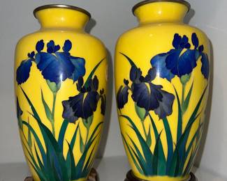 Yellow vases with blue irises