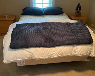Bed with comforter and pillows, all sold separtely