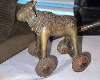 Vintage Indian rolling bull toy