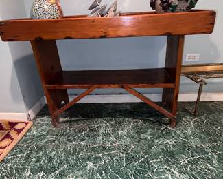 Rustic console table with diagonal support legs