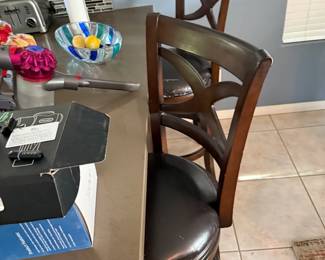 Useful dark wood swivel bar stools