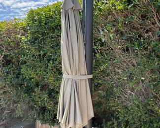 Large outdoor umbrella with lights in good condition