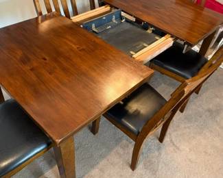 78" dining room table with self storing leaf, 60" when leaf is stored