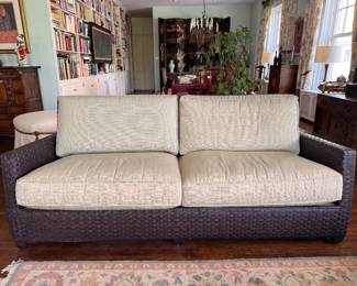 Vintage McGuire Furniture Hand-Woven Rattan Two-Seat Sofa with Custom Upholstered Cushions. Measures 80" W x 34" D. Photo 1 of 4.