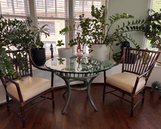 McGuire Chairs Pictured with McGuire Green Glass-Top Bamboo & Rattan Dining Table. Measures 42" D x 29" H with 28 6/8" Clearance. Photo 1 of 4.