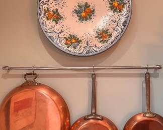 Decorative Hand-Painted Porcelain Bowl Pictured with Copper Cookware.
