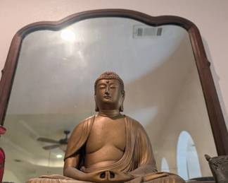 gold tone Buddha statue 