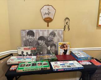 Vintage board games, Beatles poster, Beatles Monopoly, Rolling Stones magazines, various versions of Monopoly