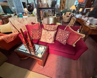 Lovely Red Sofa from local designers home with unusual Art Deco wood coffee table bar cabinet with mirrored top