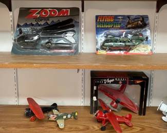 Vintage Toy Helicopters and 1932 Lockheed Vega Model Airplane