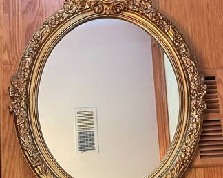 Ornate Gilt Oval Wall Mirror with Floral and Foliate Motif