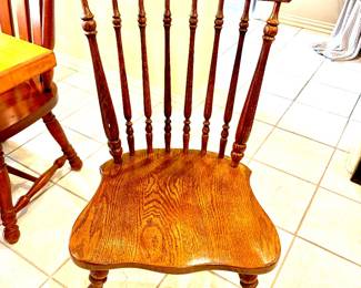 Several styles of vintage wood chairs