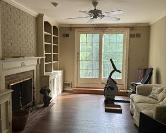 Exercise bike & sofas, & sculptures